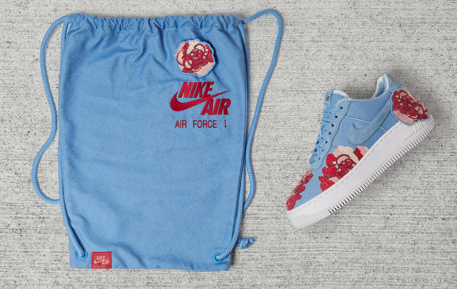 blue nikes with flowers