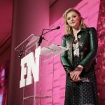 Chloe Grace Moretz presents Victor Luis CEO Coach Inc. with teh Person of the Year Award at the 2017 FN Achievement Awards Credit Patrick MacLeod