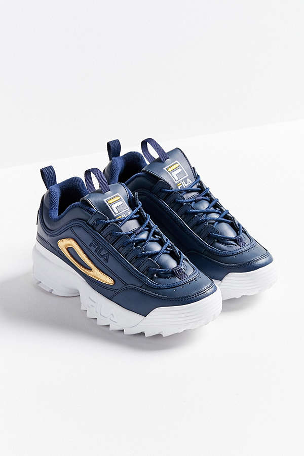 black and gold fila shoes