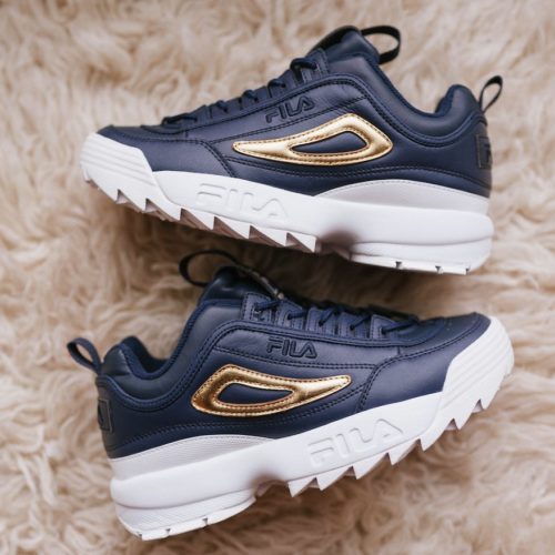 black and gold fila disruptor