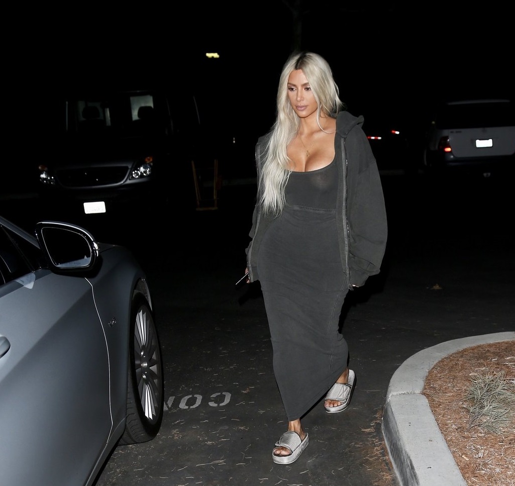 kim in yeezy slides