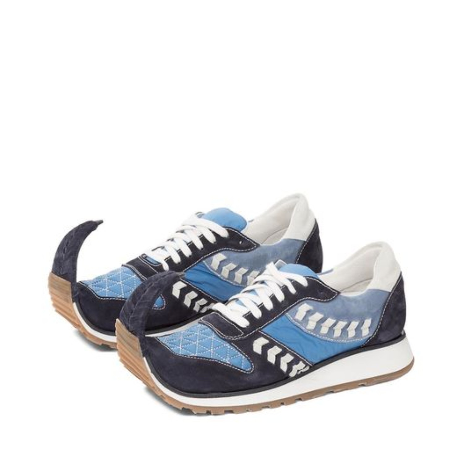 Loewe s Babouche Inspired Dinosaur Sneakers Make A Pointed Statement