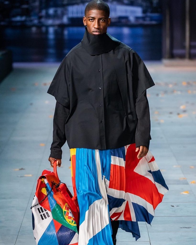 Virgil Abloh Wears Off-White x BAPE Sneaker On Louis Vuitton Runway